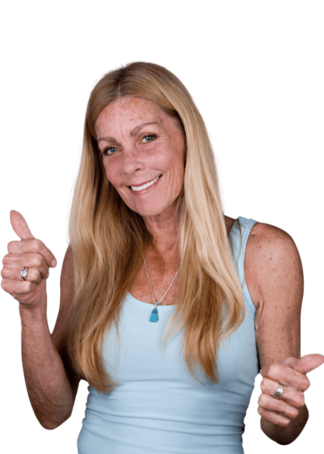 Middle age patient in Los Algodones Dental Group smiling after her affordable all on 4 implants