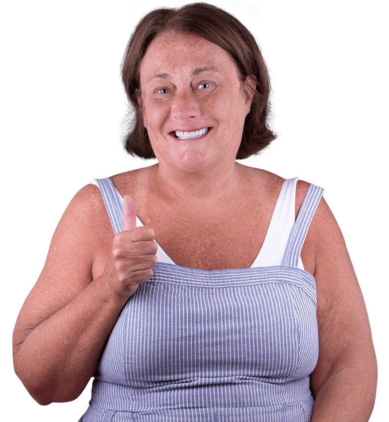 woman smiling after her treatment