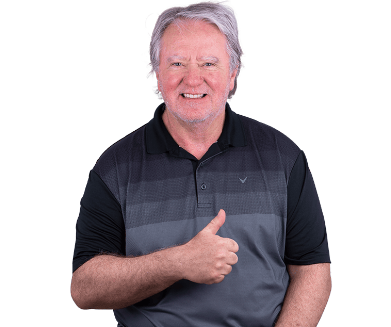 elderly gentleman happy about his dental treatment posing